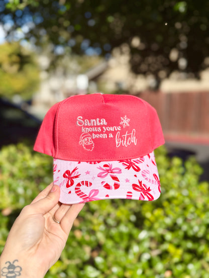 Santa Knows You’ve Been A…. Embroidered Christmas Trucker Hat